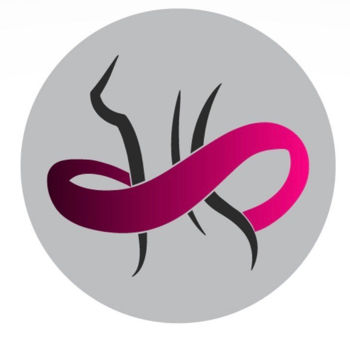 Parent company, women’s health partners of the Permian basin logo of woman figure with infinity pink ribbon around her.